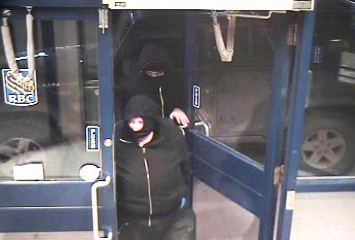Pair armed with handgun, knife rob man using an ATM machine in Saskatoon.