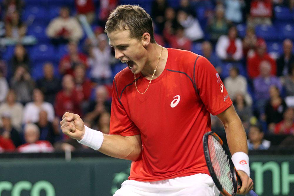 Vasek Pospisil celebrates  as Canada advances to the next round of the Davis Cup with a 3-2 victory over Japan.
