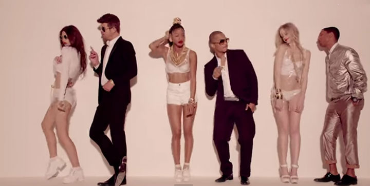 A scene from the "Blurred Lines" video featuring Robin Thicke, T.I. and Pharrell Williams.