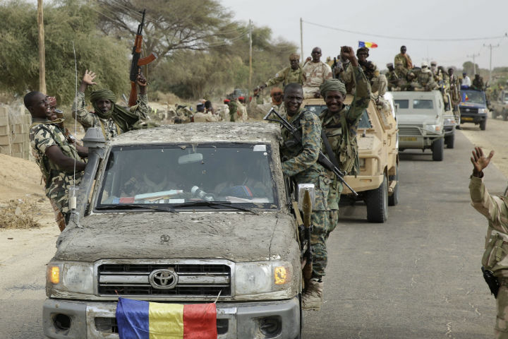 Chadian soldiers escorting a group of journalists ride on trucks and pickups in the Nigerian city of Damasak, Nigeria, Wednesday, March 18, 2015. Damasak was flushed of Boko Haram militants last week, and is now controlled by a joint Chadian and Nigerien force.