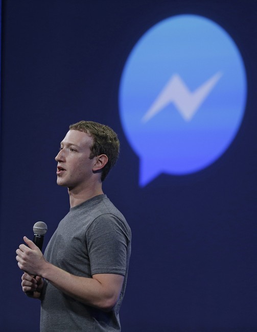 CEO Mark Zuckerberg talks about the Messenger app during the Facebook F8 Developer Conference Wednesday, March 25, 2015, in San Francisco. Facebook is trying to mold its Messenger app into a more versatile communications channel as smartphones create new ways for people to connect with friends and businesses beyond the walls of the company's ubiquitous social network.