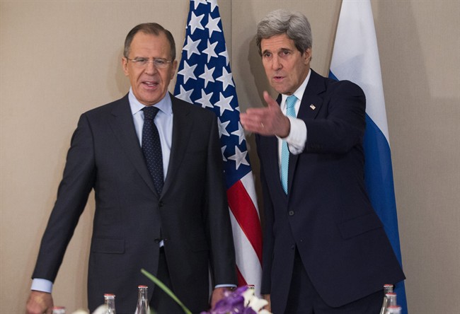 U.S. Secretary of State John Kerry, right, meets with Russian Foreign Minister Sergey Lavrov Monday, March 2, 2015 in Geneva.