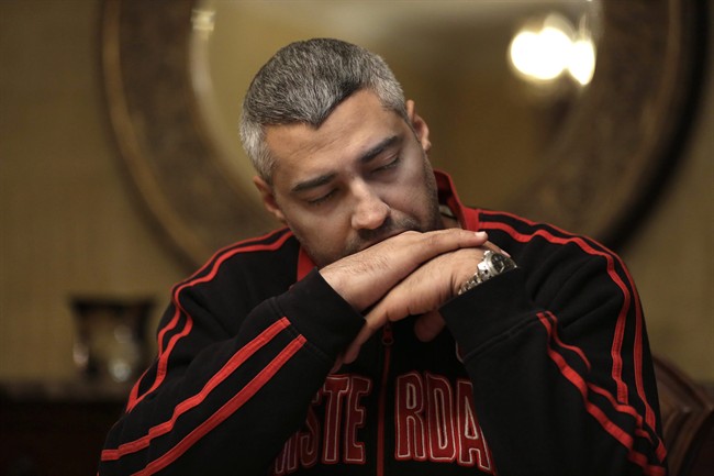 Canadian Al-Jazeera English journalist Mohamed Fahmy pauses during an interview with The Associated Press in Cairo, Egypt, Thursday, Feb. 19, 2015. 