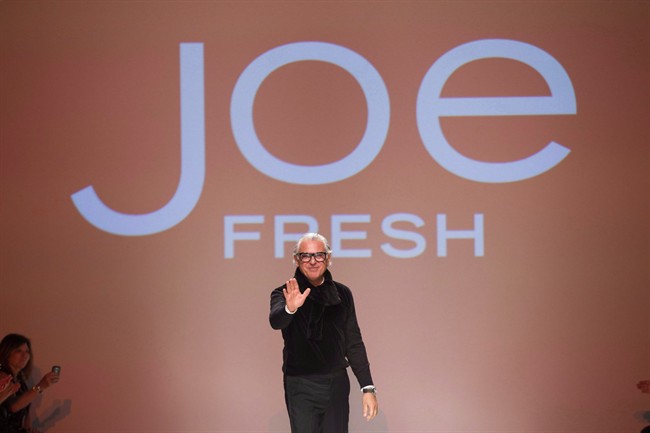 Joe Mimran greets the audience after the Joe Fresh show during Toronto Fashion Week in Toronto on March 20, 2013. 