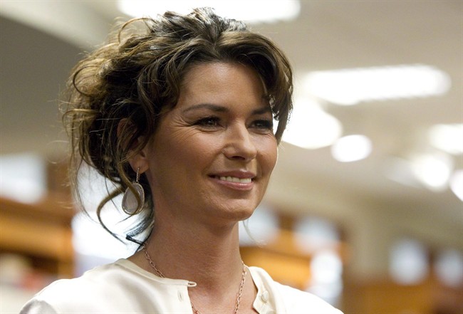Shania Twain arrives to sign copies of her new book "From This Moment On" in Toronto Monday, May 9, 2011.