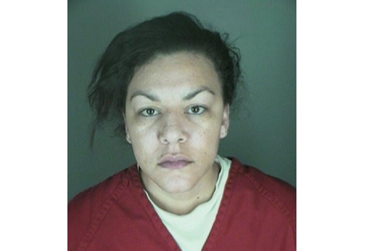 FILE - In this undated file photo, provided by the Longmont Police Department shows Dynel Lane, 34, who is accused of stabbing a pregnant woman in the stomach and removing her baby, while the expectant mother visited her home to buy baby clothes advertised on Craigslist authorities said. Catherine Olguin, a spokeswoman for the Boulder County District Attorney's Office, said Thursday, March 26, 2015, that Lane will not be charged with murder in the baby's death. 