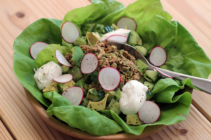 This March 9, 2015 photo shows edamame and walnut lettuce wraps in Concord, N.H. This recipe pairs firm edamame with crunchy walnuts and some spices to make a cold vegetarian “meat” for lettuce wraps or tacos.