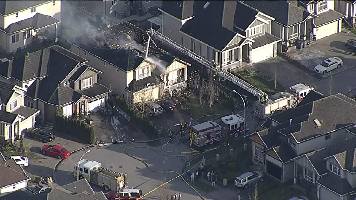 Roof collapses but no injuries in Surrey house fire | Globalnews.ca