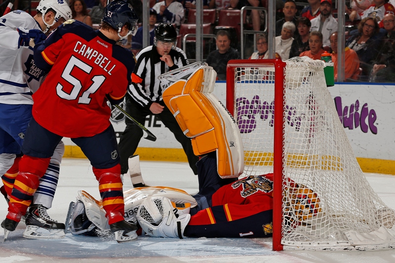 Goaltender Roberto Luongo #1 of the Florida Panthers falls back into the net after making a first-period save against the Toronto Maple Leafs at the BB&T Center on March 3, 2015 in Sunrise, Florida. 