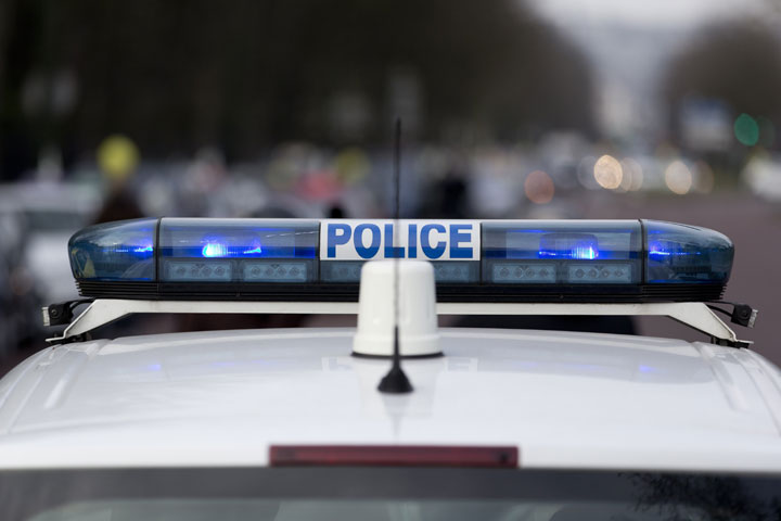 A picture taken on February 9, 2015 in Paris shows the emergency light of a police car. 