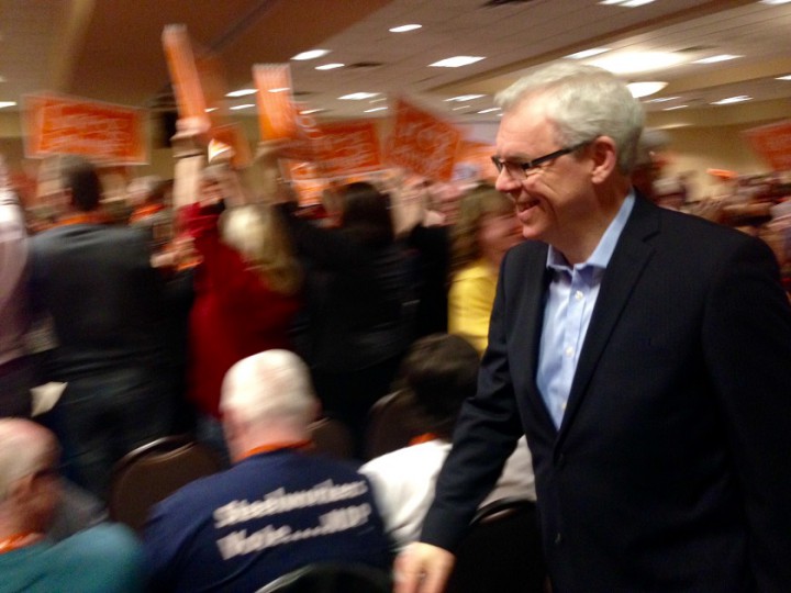 A triumphant Greg Selinger walks through the crowd at the Manitoba NDP leadership convention in March.