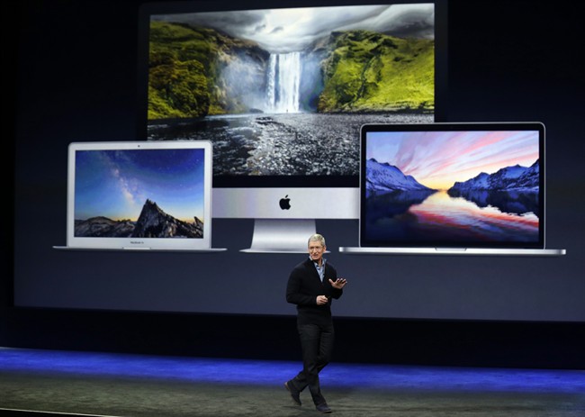 Apple CEO Tim Cook introduces the new Apple MacBook during an Apple event on Monday, March 9, 2015, in San Francisco.