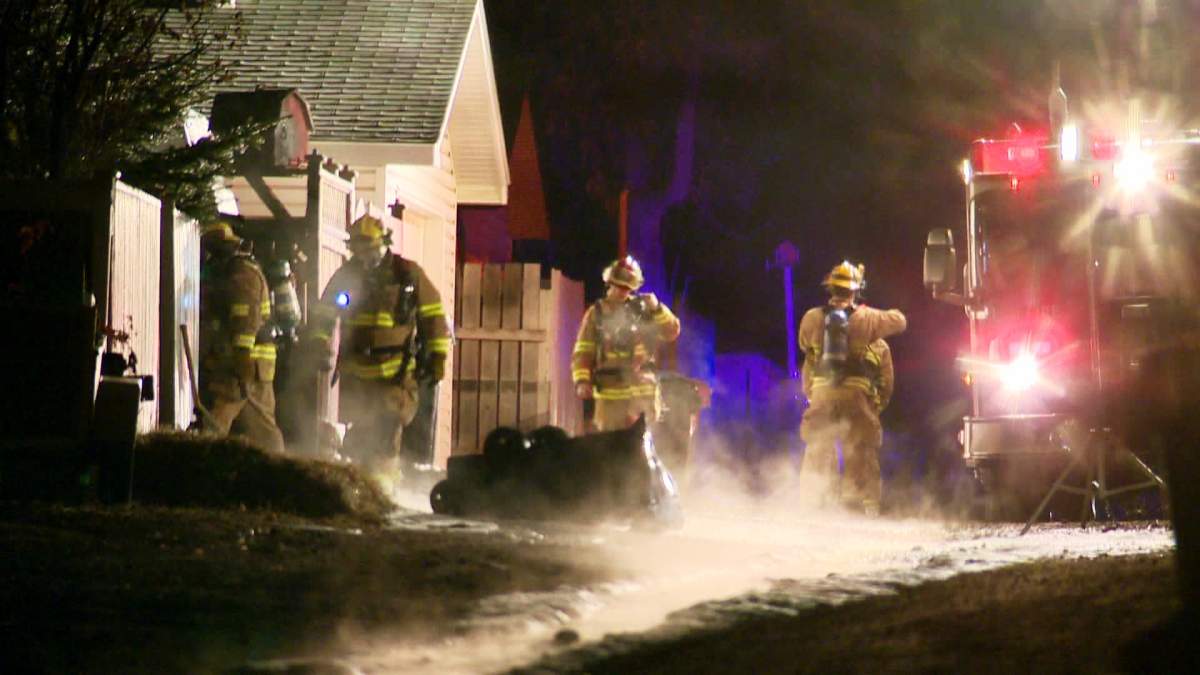 Firefighters respond to a blaze along Frobisher Boulevard S.E. on Friday, March 20, 2015.