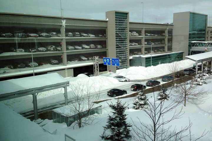 Parking lots at the Halifax Stanfield International Airport were snowy and full on Thursday, March 19, 2015.