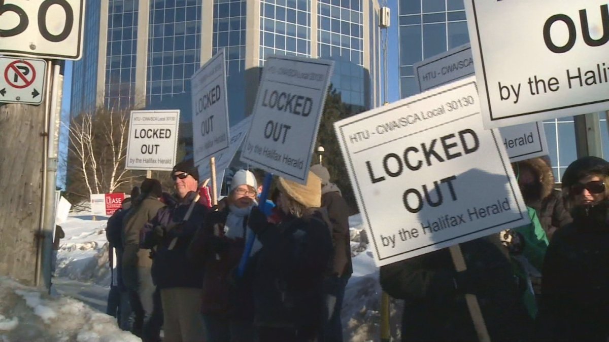 Protesters gather at the Chronicle Herald to support locked out workers