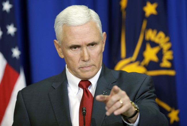 Indiana Gov. Mike Pence takes a question during a news conference, Tuesday, March 31, 2015, in Indianapolis. Pence said that he wants legislation on his desk by the end of the week to clarify that the state's new religious-freedom law does not allow discrimination against gays and lesbians.
