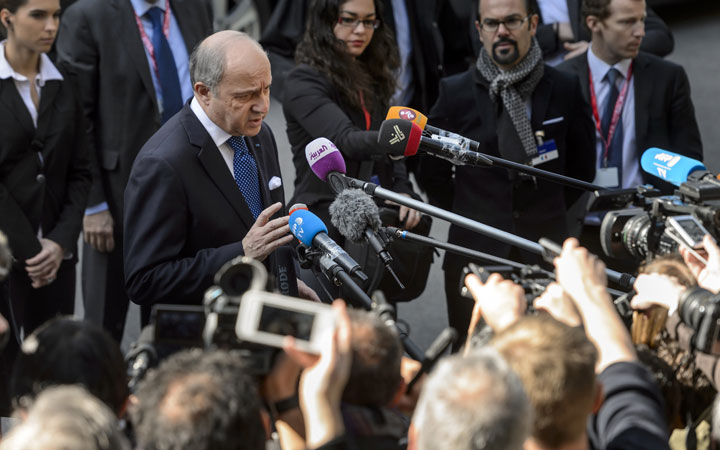 French Foreign Minister Laurent Fabius (L) arrives on March 28, 2015 for nuclear talks with Iran in Lausanne. 