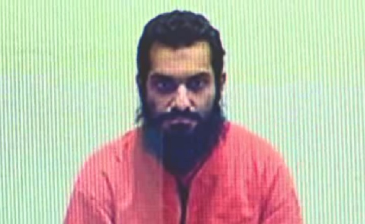 Image capture of Toronto terror suspect Jahanzeb Malik during a video conference hearing inside Lindsay, Ontario prison on March 16, 2015.
