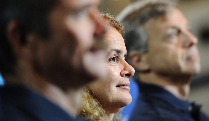 Canadian astronauts Chris Hadfield, left to right, Julie Payette and Robert Thirsk  takes part in the opening of The Living In Space exhibit during its unveiling at the Canadian Aviation and Space Museum in Ottawa on Thursday, May 12, 2011.