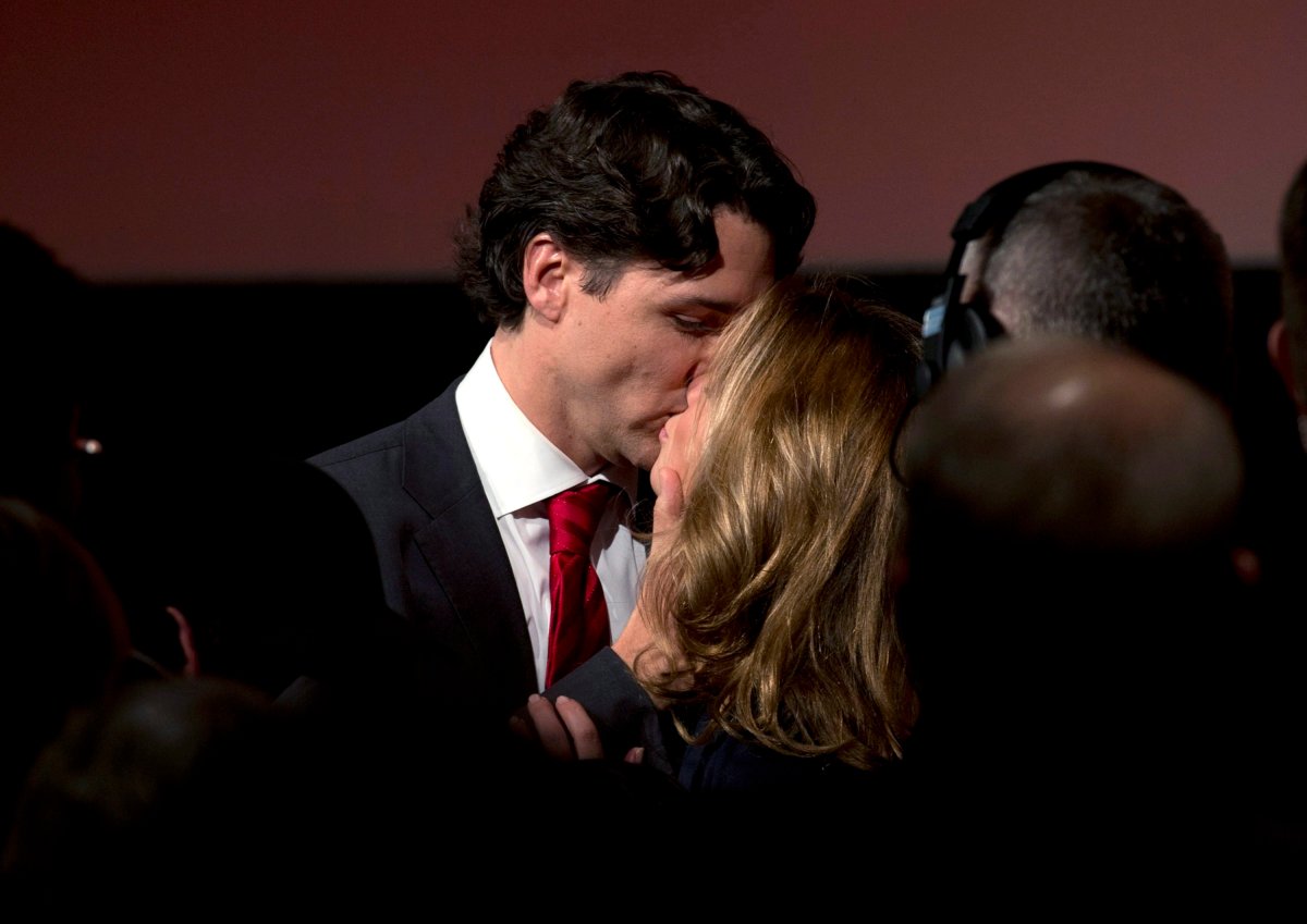 Justin Trudeau kisses his wife Sophie Gregoire as they leave the stage after he won the Federal Liberal leadership Sunday April 14, 2013 in Ottawa. THE CANADIAN PRESS/Adrian Wyld