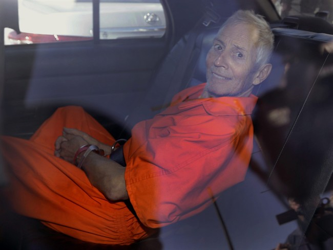 FILE - In this Tuesday, March 17, 2015, file photo, Robert Durst is transported from Orleans Parish Criminal District Court to the Orleans Parish Prison after his arraignment in New Orleans. 