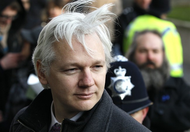 FILE - In this Feb. 1, 2012 file photo, Julian Assange, WikiLeaks founder, arrives at the Supreme Court in London.
