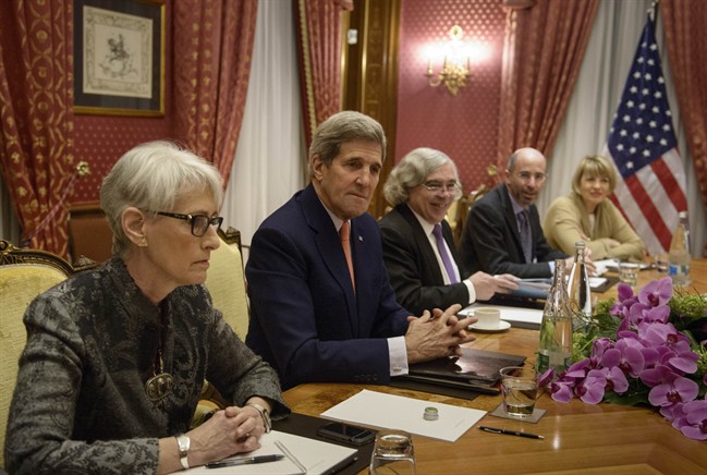 From left, US Under Secretary for Political Affairs Wendy Sherman, US Secretary of State John Kerry, US Secretary of Energy Ernest Moniz, Robert Malley of the US National Security Council and European Union Political Director Helga Schmid wait before the start of a meeting at the Beau Rivage Palace Hotel, in Lausanne, Switzerland, Saturday March 28, 2015. 