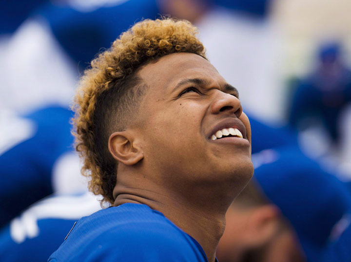 Toronto Blue Jays starting pitcher Marcus Stroman looks up at the practice facility during baseball spring training in Dunedin, Fla., on Wednesday, February 25, 2015. 
