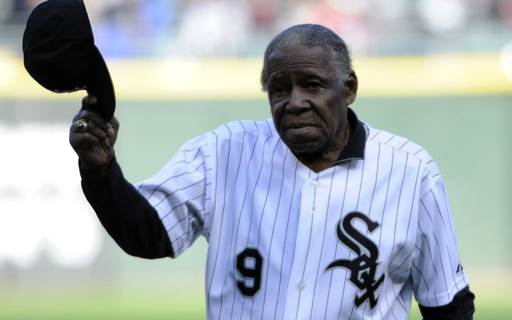 Former Chicago White Sox player Minnie Minoso throws out the first pitch before the game between the Chicago White Sox and the Tampa Bay Rays on April 26, 2014 at U.S. Cellular Field in Chicago, Illinois.