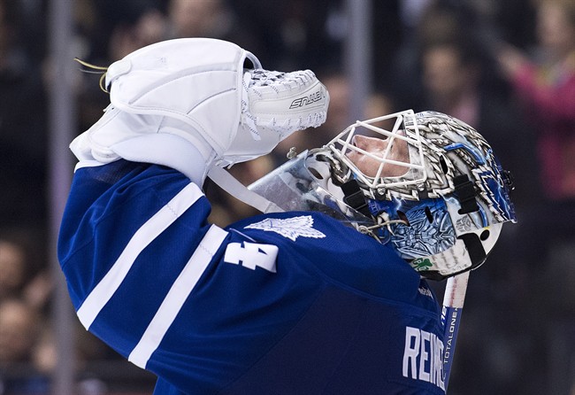 Toronto Maple Leafs goalie James Reimer reacts after defeating the Tampa Bay Lightning during third period NHL hockey action in Toronto on Tuesday, March 31, 2015.