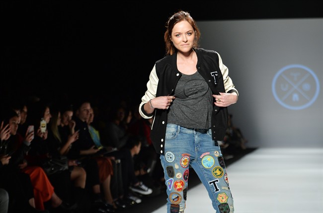 A model walks the runway for the Triarchy collection during Toronto fashion week in Toronto on Wednesday, March 25, 2015. 
