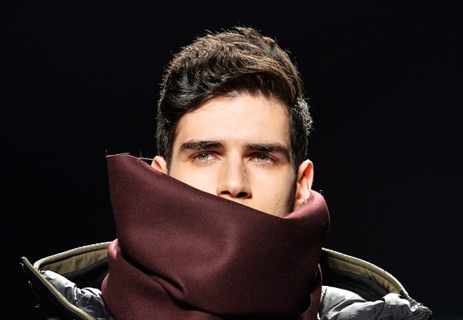 A model walks the runway for the Mackage collection during Toronto fashion week in Toronto on Wednesday, March 25, 2015. 