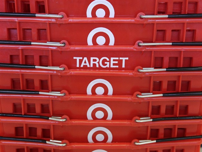 In this May 20, 2009 file photo, shopping baskets are stacked at a Chicago area Target store. 