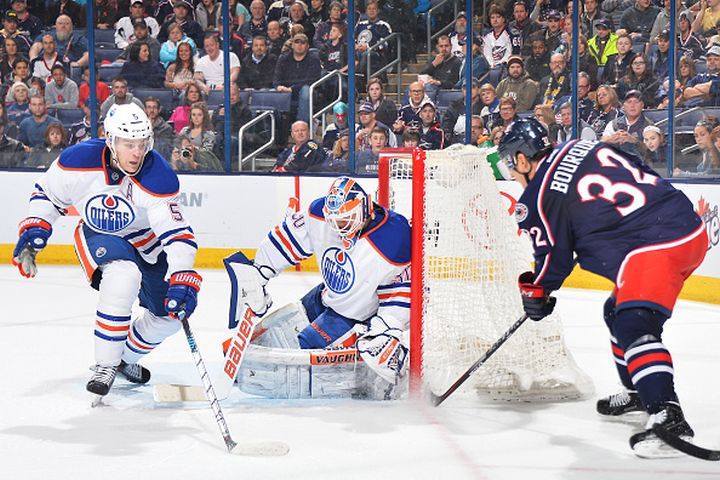 Goaltender Ben Scrivens #30 of the Edmonton Oilers makes a pad save on Rene Bourque #32 of the Columbus Blue Jackets during the third period on March 13, 2015 at Nationwide Arena in Columbus, Ohio. Columbus defeated Edmonton 5-4 in a shootout.