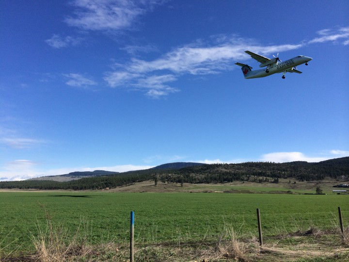 A plane comes in for a landing at Kelowna International Airport.