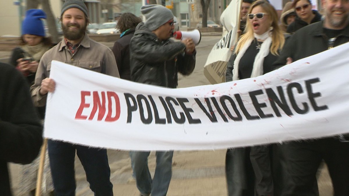 Protesters marched along Victoria Avenue from City Hall to Regina Police Service headquarters on Sunday for the International Day Against Police Brutality.