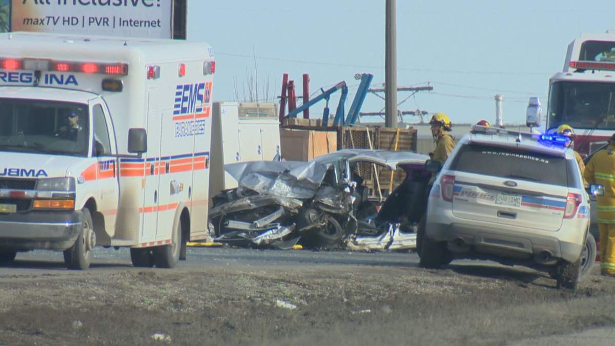 Police and EMS attend to victims after a fatal crash on Ring Road.