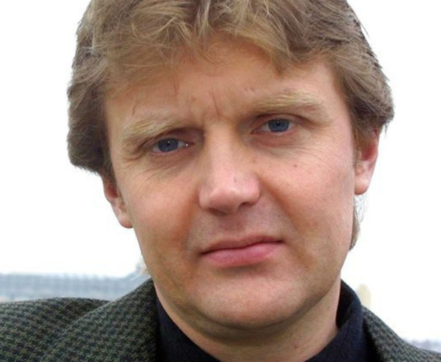 In this Friday, May 10, 2002 file photo Alexander Litvinenko, former KGB spy and author of the book ”Blowing Up Russia: Terror From Within”, is photographed at his home in London.