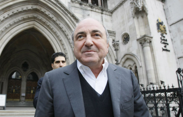 In this Wednesday, March, 10, 2010 file photo, self-exiled oligarch Boris Berezovsky leaves the High Court in London after winning his libel case against a Russian broadcaster that accused him of masterminding the murder of a former Russian agent in London.
