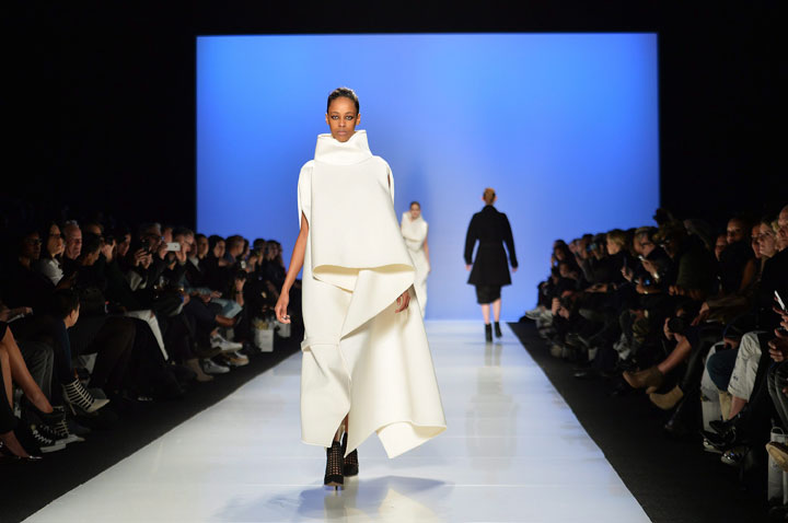 A model walks the runway for the Sid Neigum collection during Toronto fashion week in Toronto on Monday, March 23, 2015.