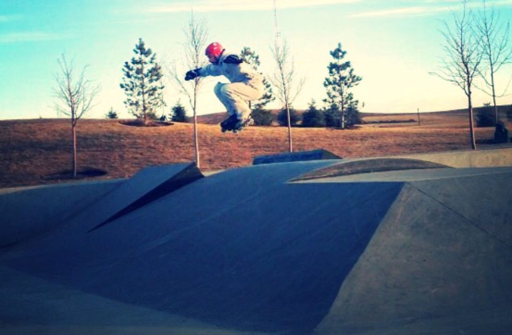 Skaters prepare to hurtle down an ice track that weaves through downtown Edmonton at speeds of over 60 km/hr.