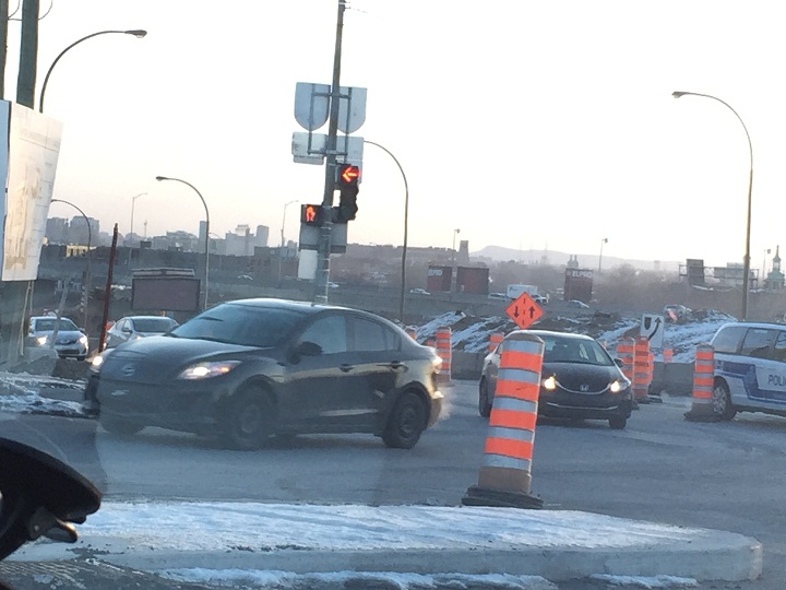 A glimpse of traffic on St. Jacques Street in Montreal on March 23, 2015.