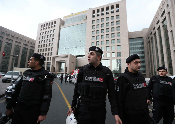 Members of special security forces stand outside the main courthouse in Istanbul, Turkey, Tuesday, March 31, 2015.
