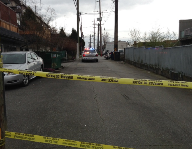 Burnaby RCMP investigate a shooting at the 3800 block of Hastings Street on March 27, 2015. 