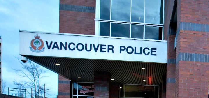 Police say a 28-year-old tossed a smoke grenade into the lobby of VPD headquarters at 2120 Cambie St.