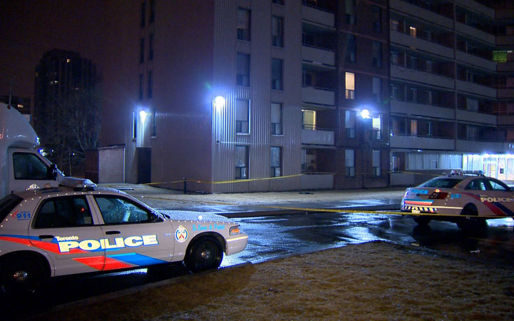 Toronto police respond to a homicide in Etobicoke, Saturday, March 21, 2015. 