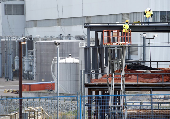 Workers assemble a new building at the Darlington nuclear facility in Courtice, Ontario, on Thursday, October 30, 2014. 