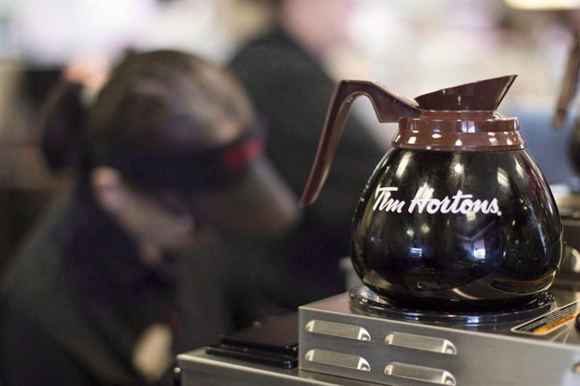 Tim Hortons was applauded and criticized after pulling an ad for Enbridge Gas from their in-store televisions.