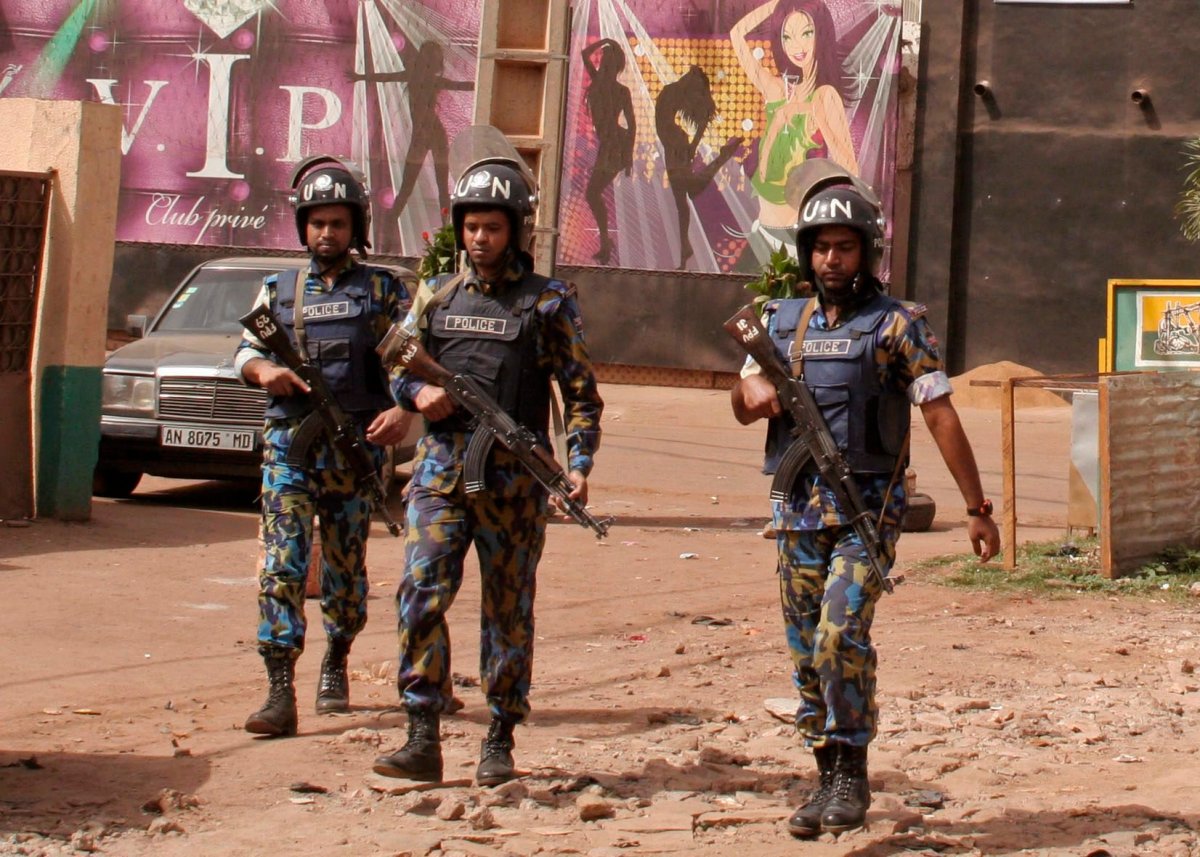 U.N. forces provide security for a nightclub on Saturday, March 7, 2015 after it was attacked by gunmen in Bamako, Mali.