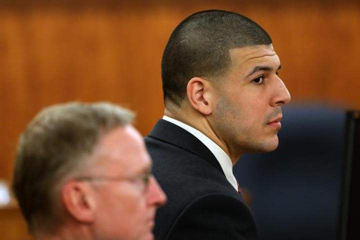 Former New England Patriots Aaron Hernandez at Bristol County Superior Court in Fall River, Mass., with his attorney Charles Rankin.